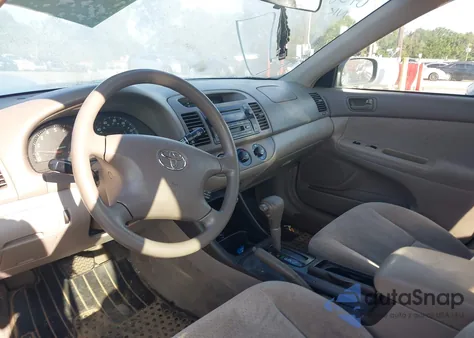 2002 Toyota Camry Le from USA, damaged, VIN 4T1BE32K12U530897